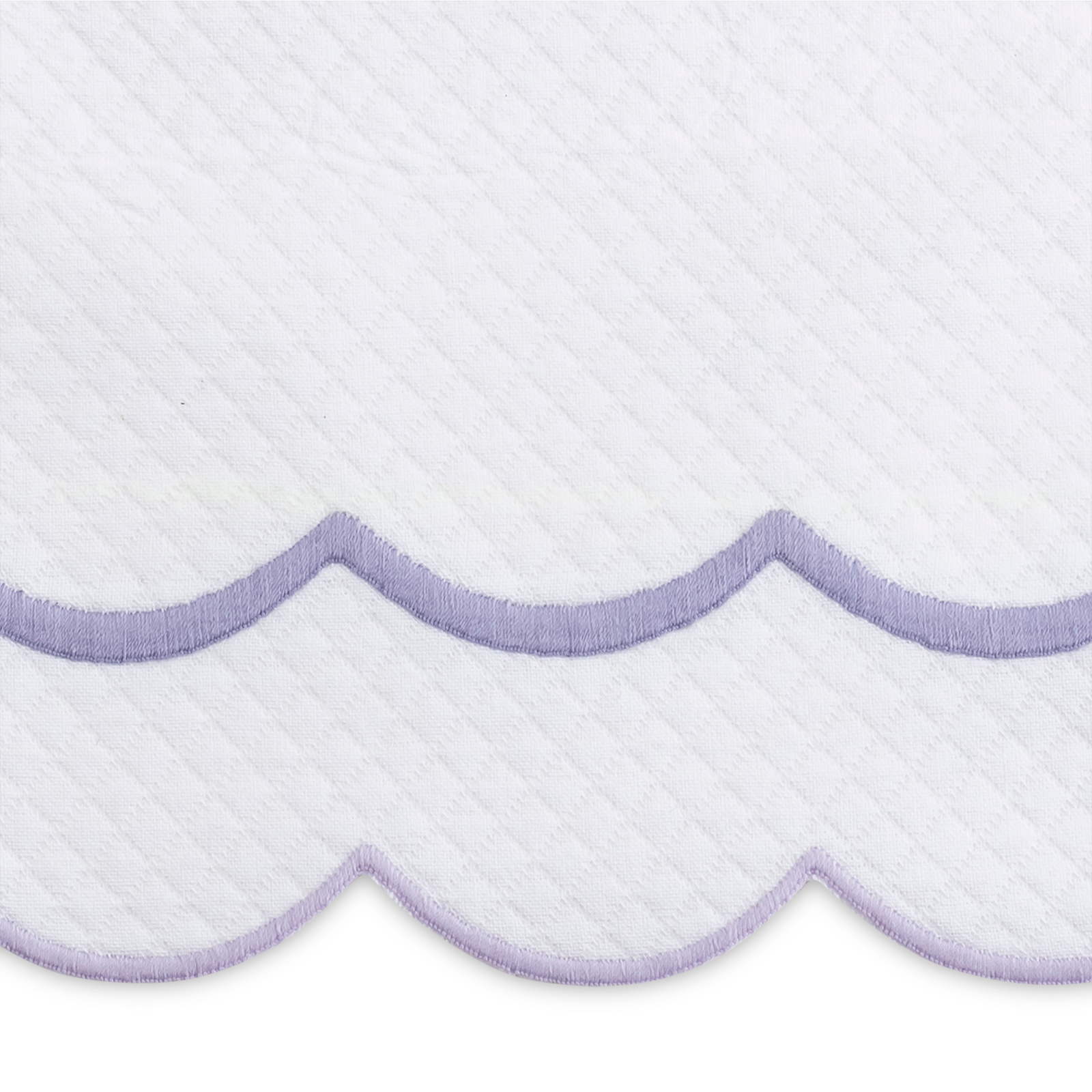 Full Bedding in a Room Dressed in Matouk India Pique Collection in Lilac Color