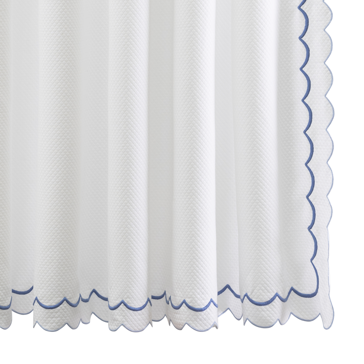 Hanging Edges of Matouk Indie Pique Shower Curtain in Azure Color