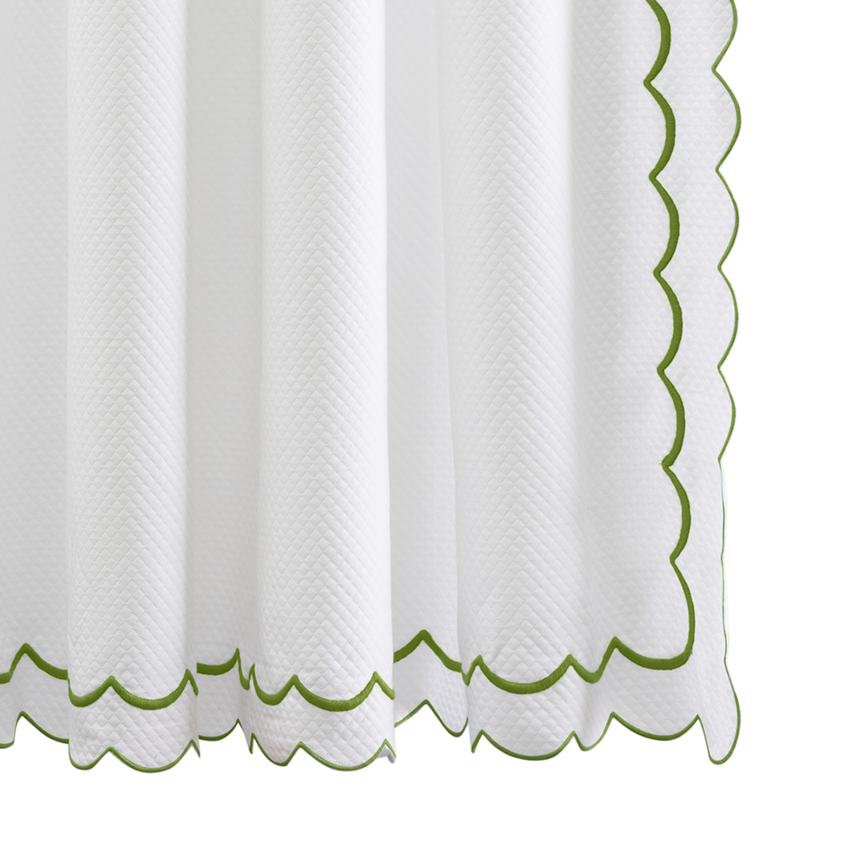 Hanging Edges of Matouk Indie Pique Shower Curtain in Grass Color
