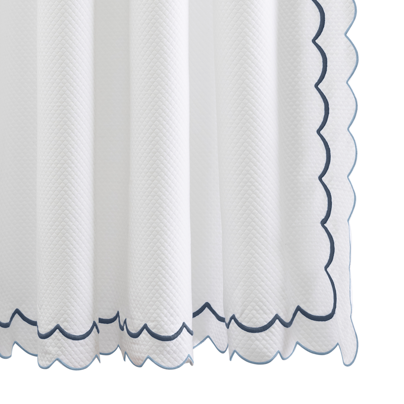 Hanging Edges of Matouk Indie Pique Shower Curtain in Hazy Blue Color