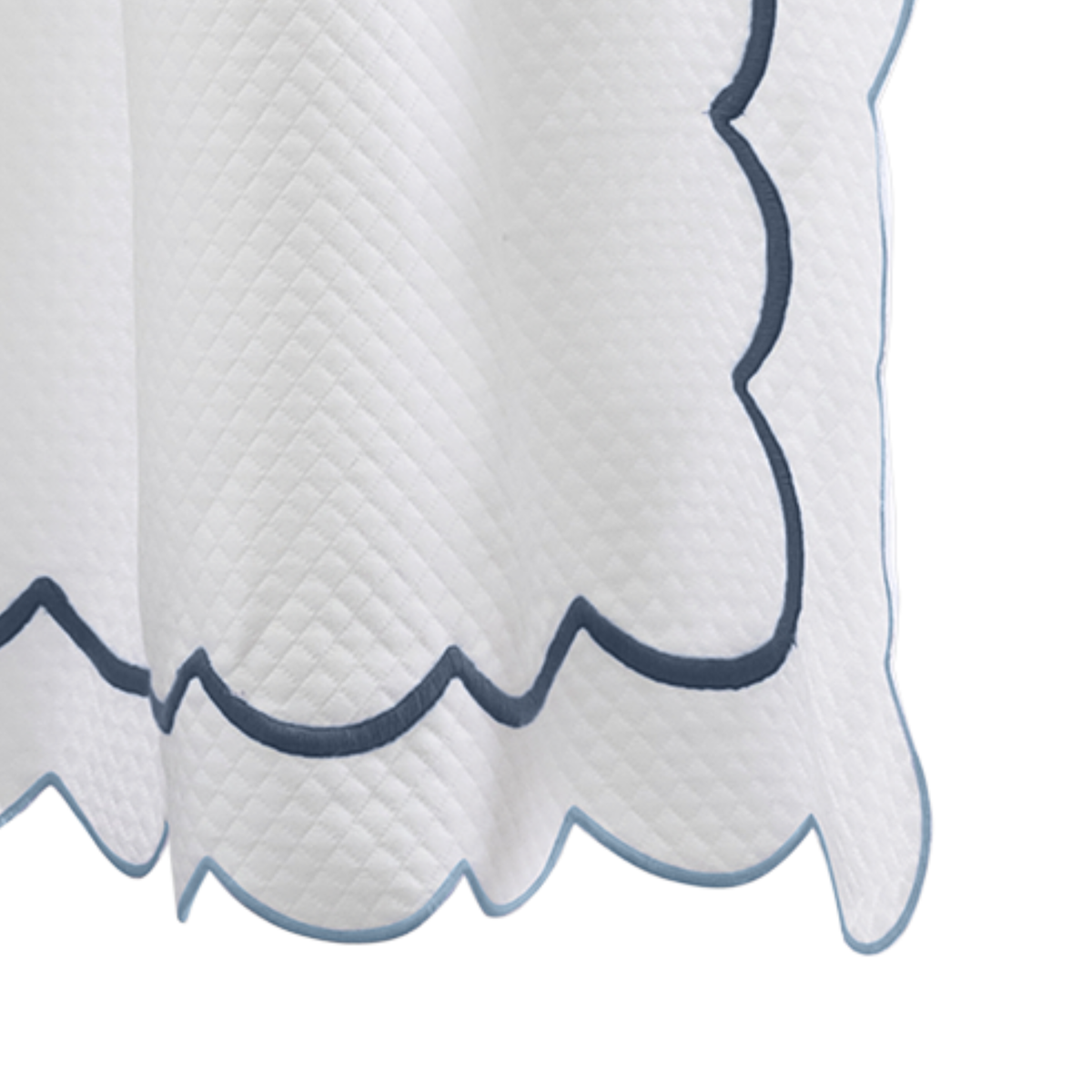 Closeup of Matouk Indie Pique Shower Curtain in Hazy Blue Color