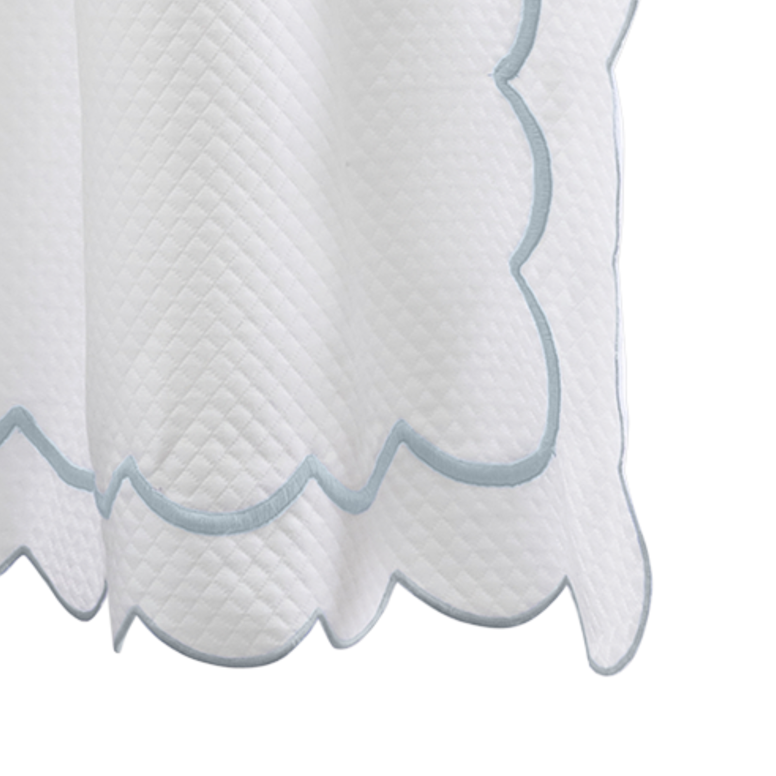 Hanging Edges of Matouk Indie Pique Shower Curtain in Pool Color