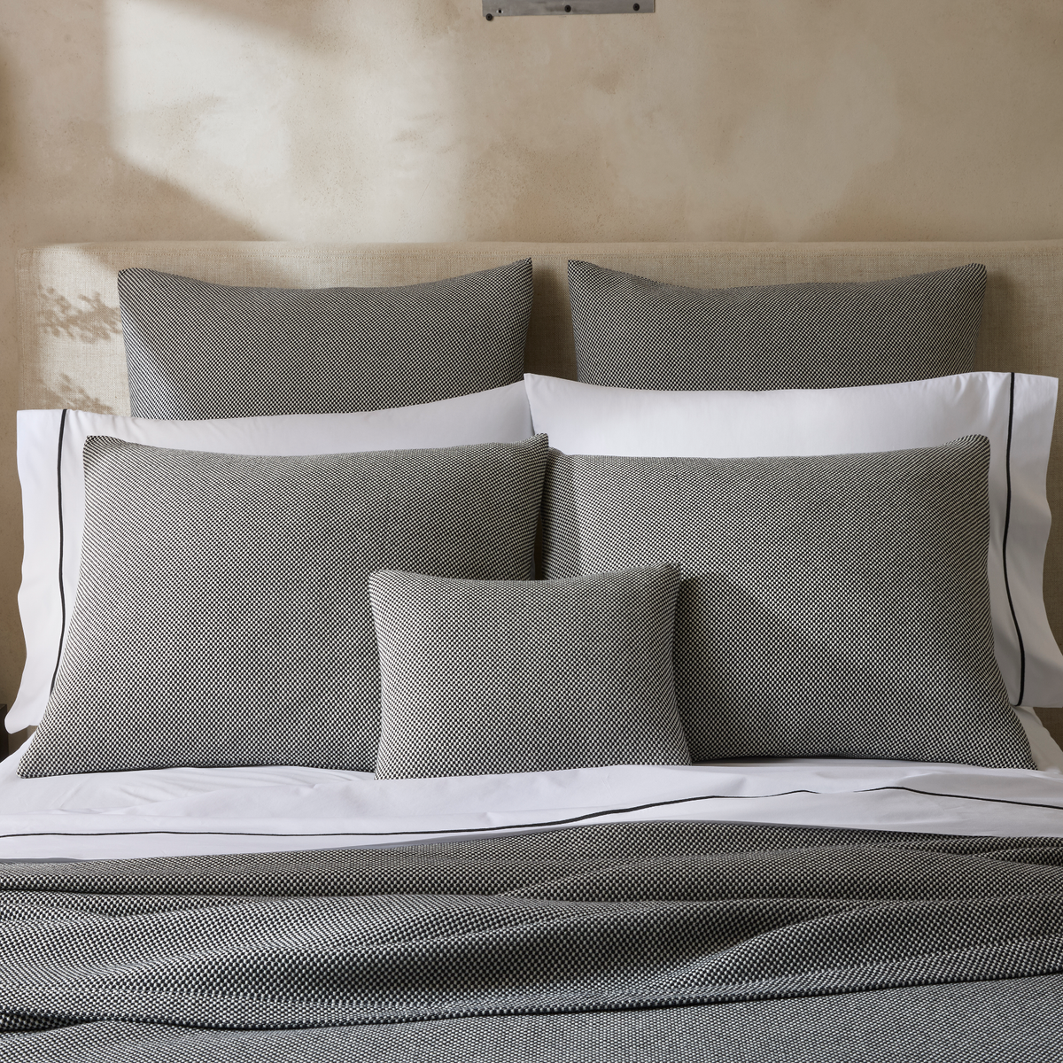 Bed with Shams from Matouk Jackson in Black shown with Bergamo in Black