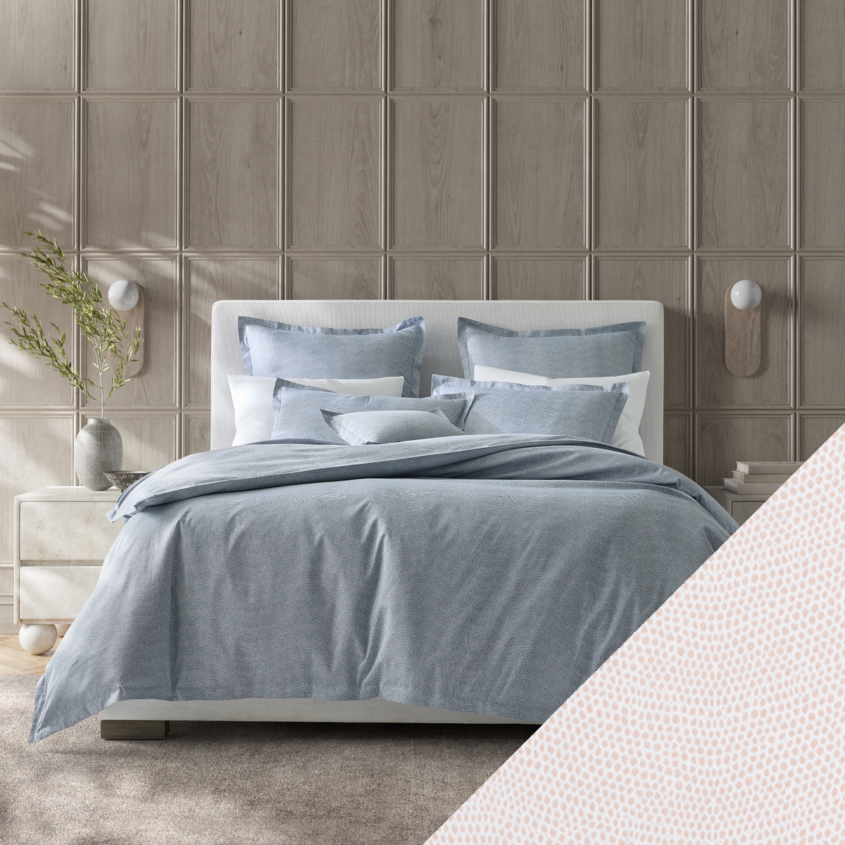 Full Bed Dressed in Steel Blue Matouk Jasper Bedding with Pink Swatch