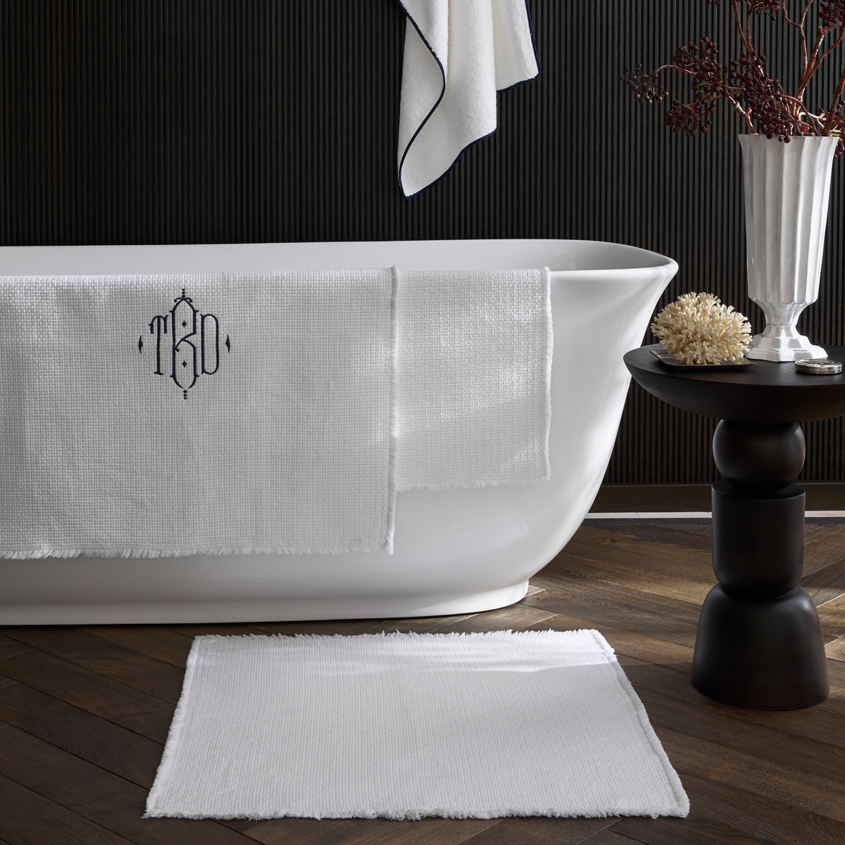 White Matouk Keiko Rugs with Cairo bath towel in black