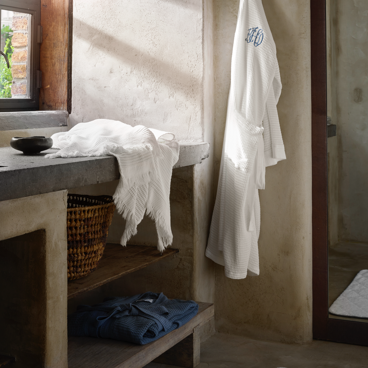 Bathroom with Matouk Kiran Waffle Towels and Robe 