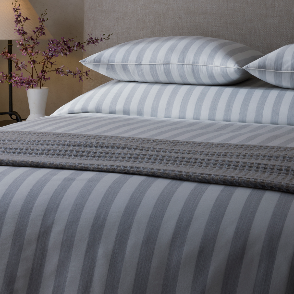 Closeup of Matouk Lana Bedding in Silver Stripe color 