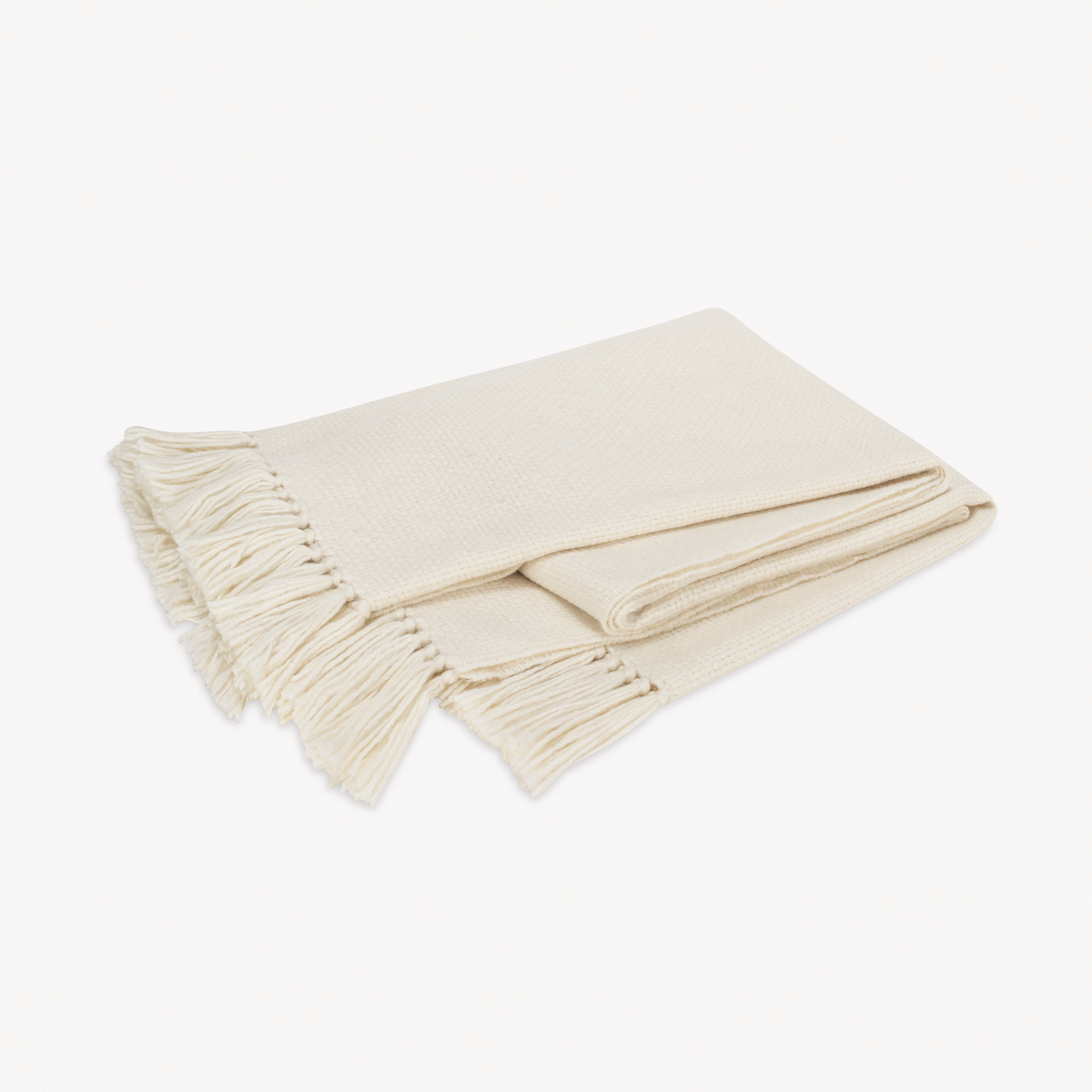 Folded Matouk Lanza Throw in Parchment