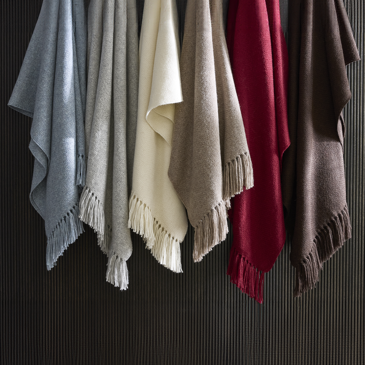 Hanging Matouk Lanza Throws in All Colors