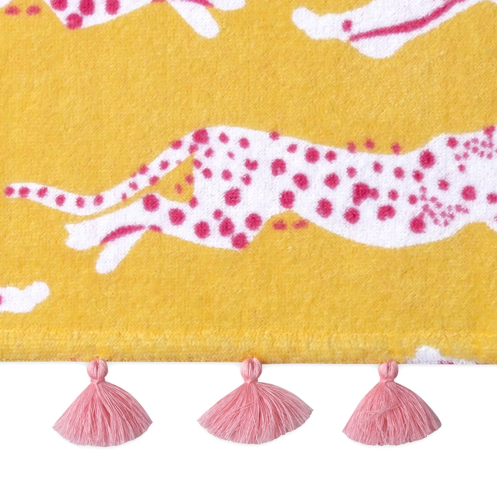 Folded Silo of Matouk Leaping Leopard Beach Towels in Color Lemonade