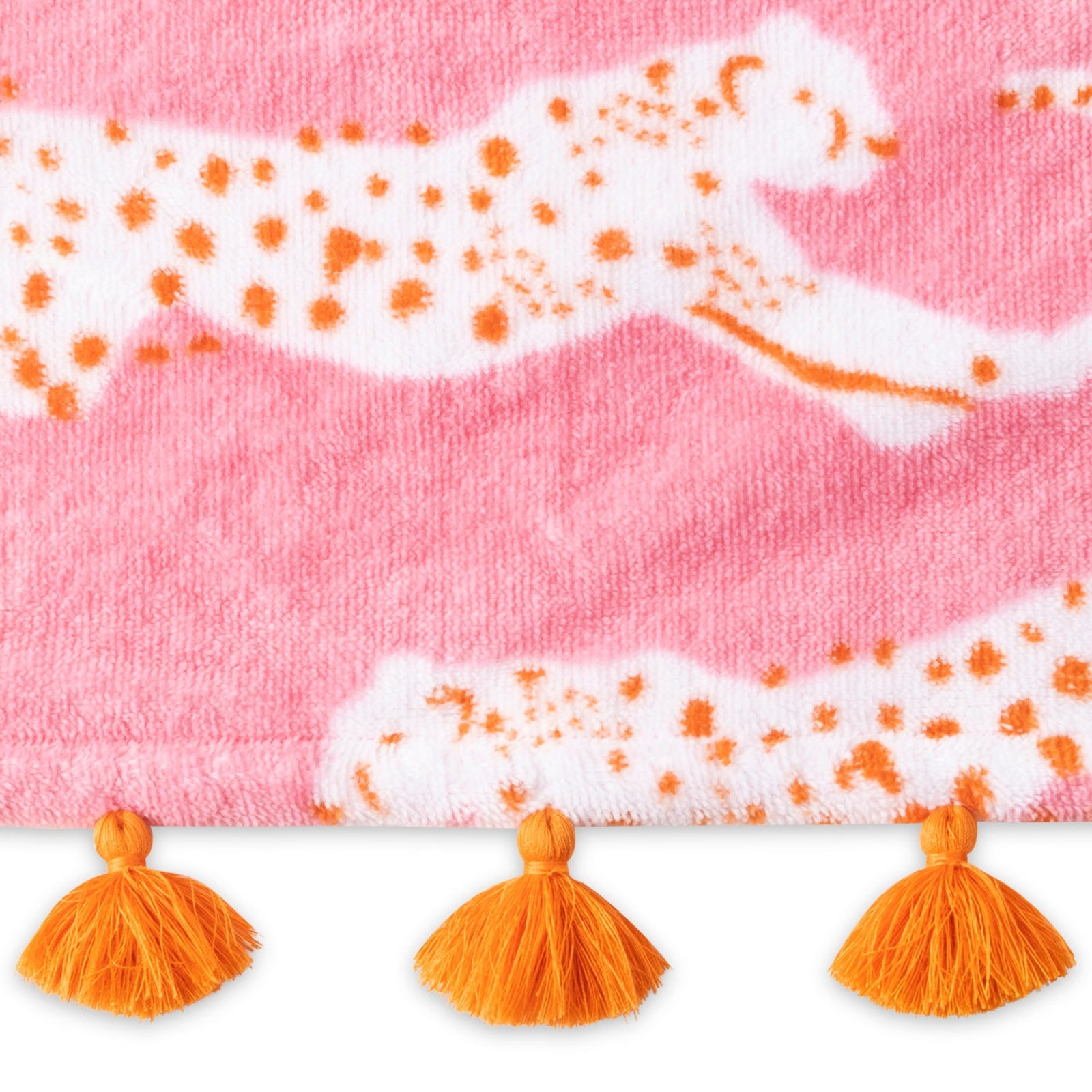 Folded Silo of Matouk Leaping Leopard Beach Towels in Color Pink Sugar