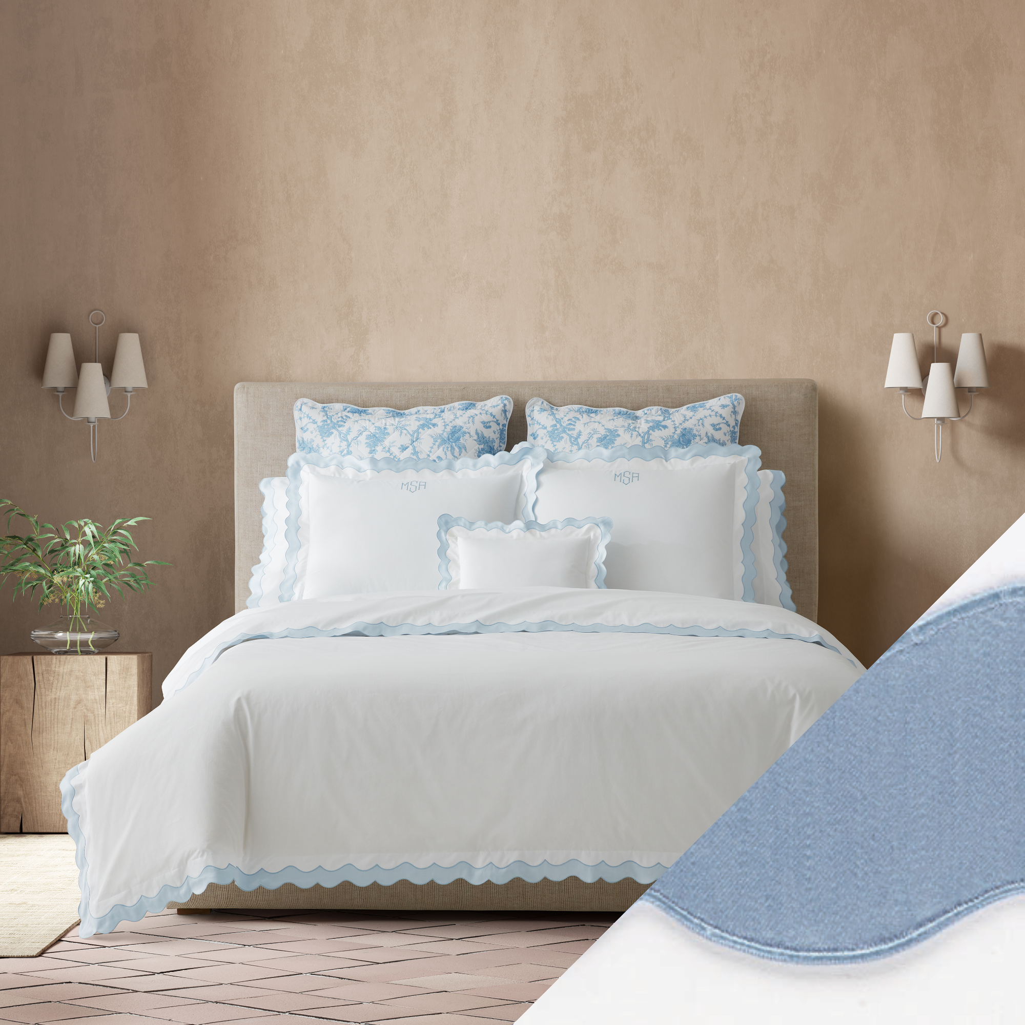 Full Bed Dressed in Matouk Lorelei Bedding in Blue Color with Hazy Blue Swatch