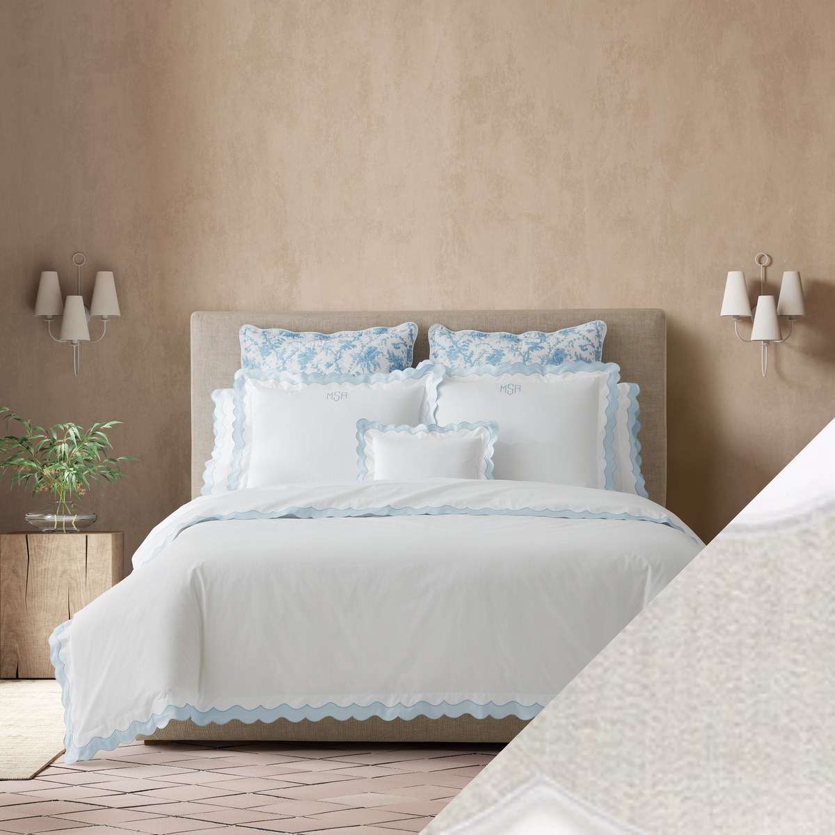 Full Bed Dressed in Matouk Lorelei Bedding in Blue Color with Silver Swatch