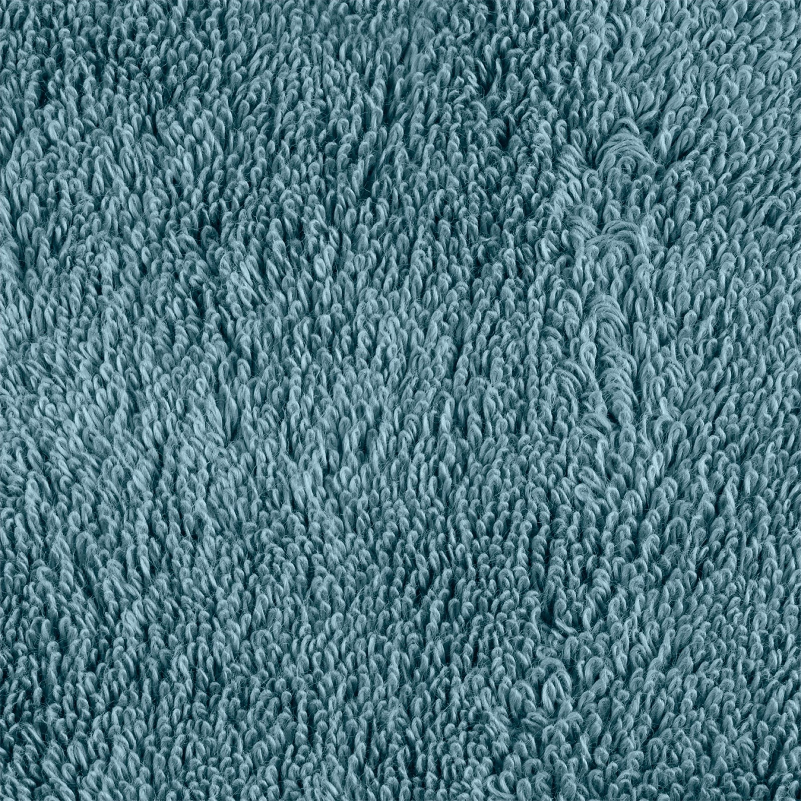 Folded Matouk Lotus Bath Towels in Aegean