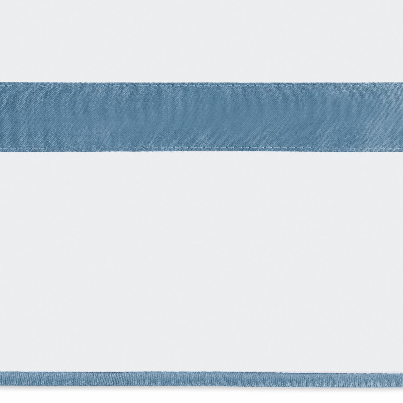 Stack of Matouk Louise Bedding in All Colors