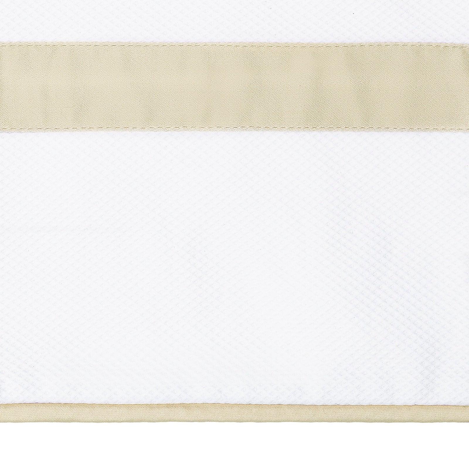 Bed Dressed in Matouk Louise Pique Bedding with Swatch in Color Dune