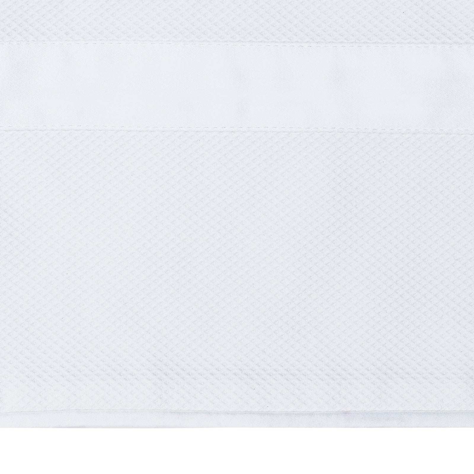 Bed Dressed in Matouk Louise Pique Bedding with Swatch in Color White