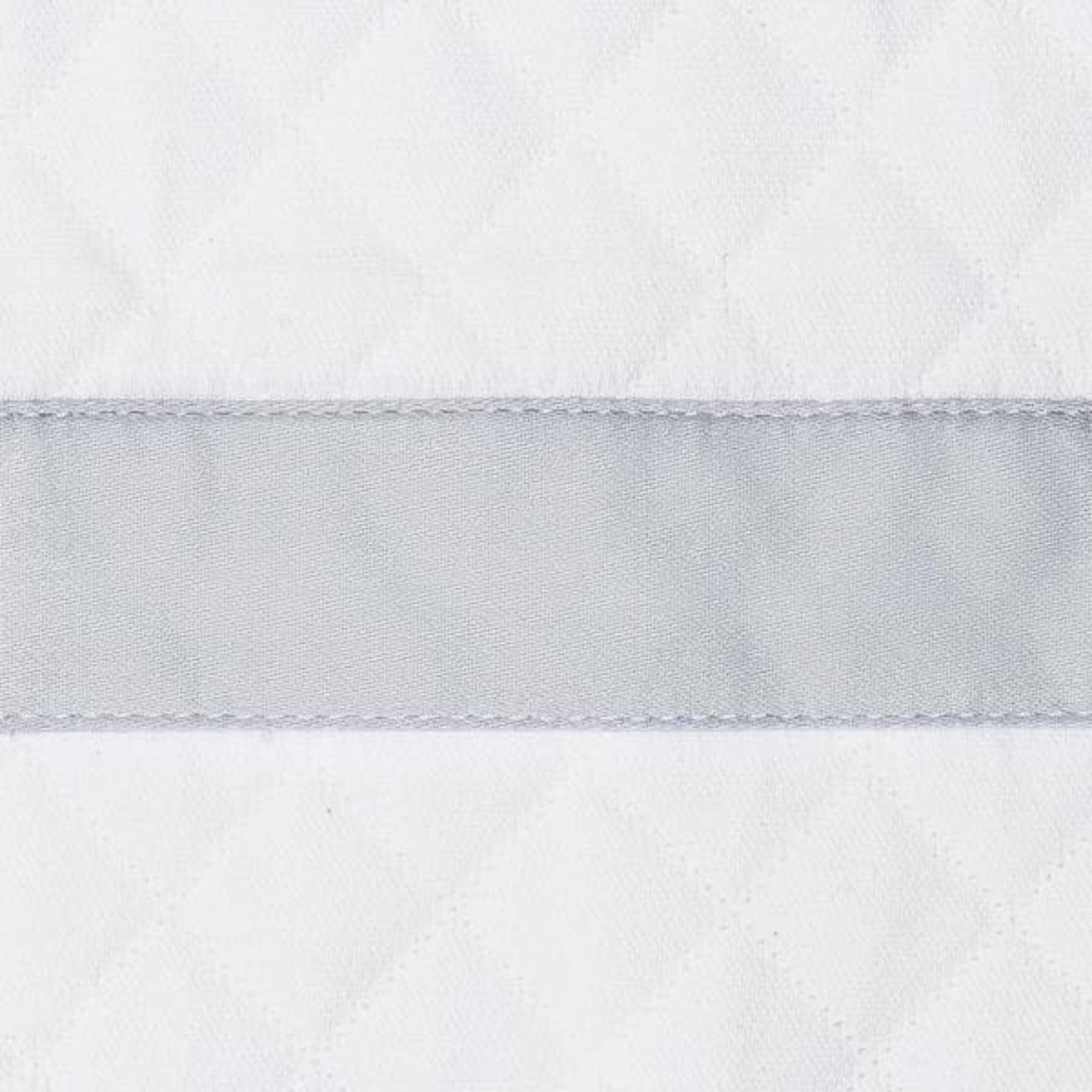 Sideview of Full Bed Dressed in Pool Matouk Lowell Matelassé Bedding with Dove Swatch