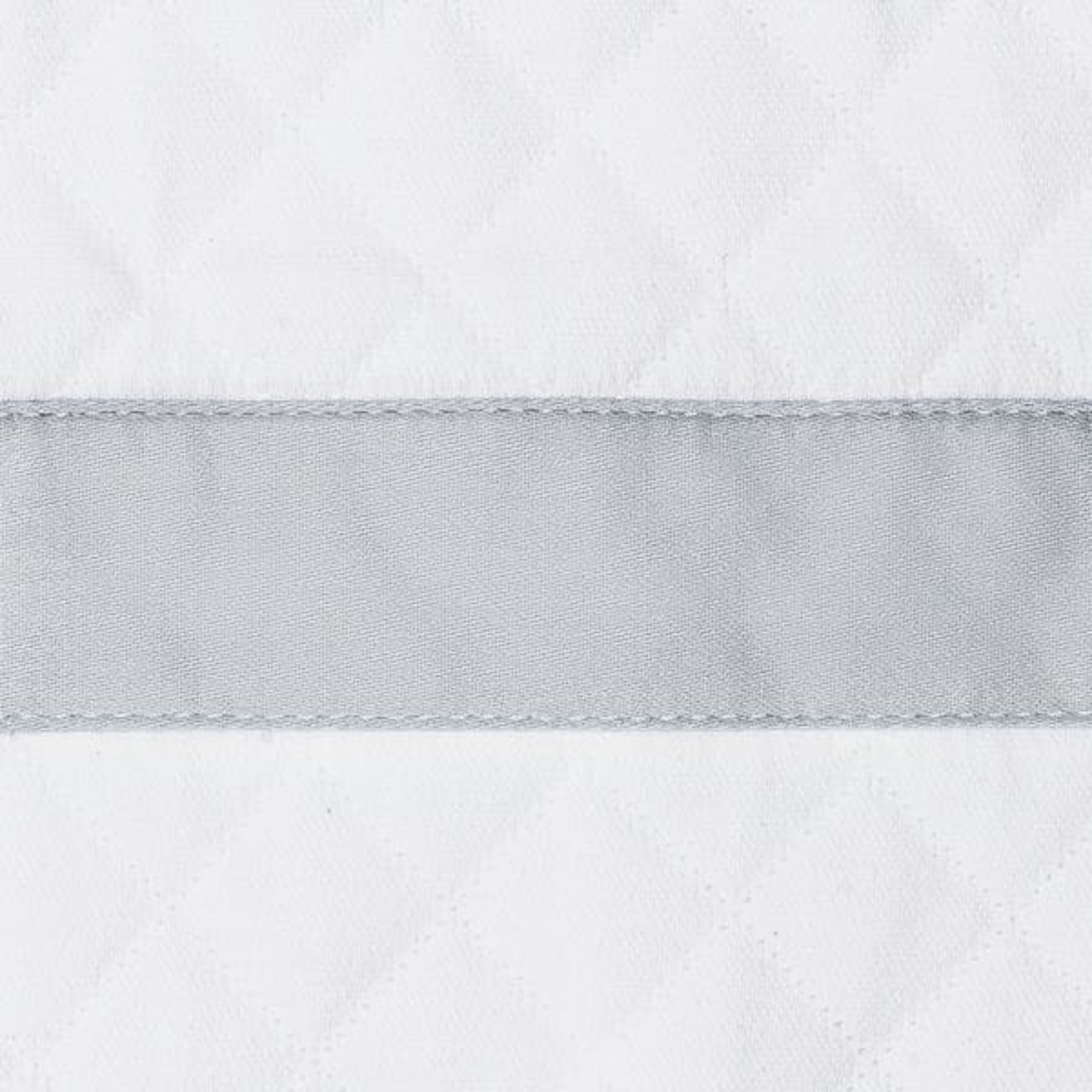 Stack of Matouk Lowell Matelassé Bedding in All Colors