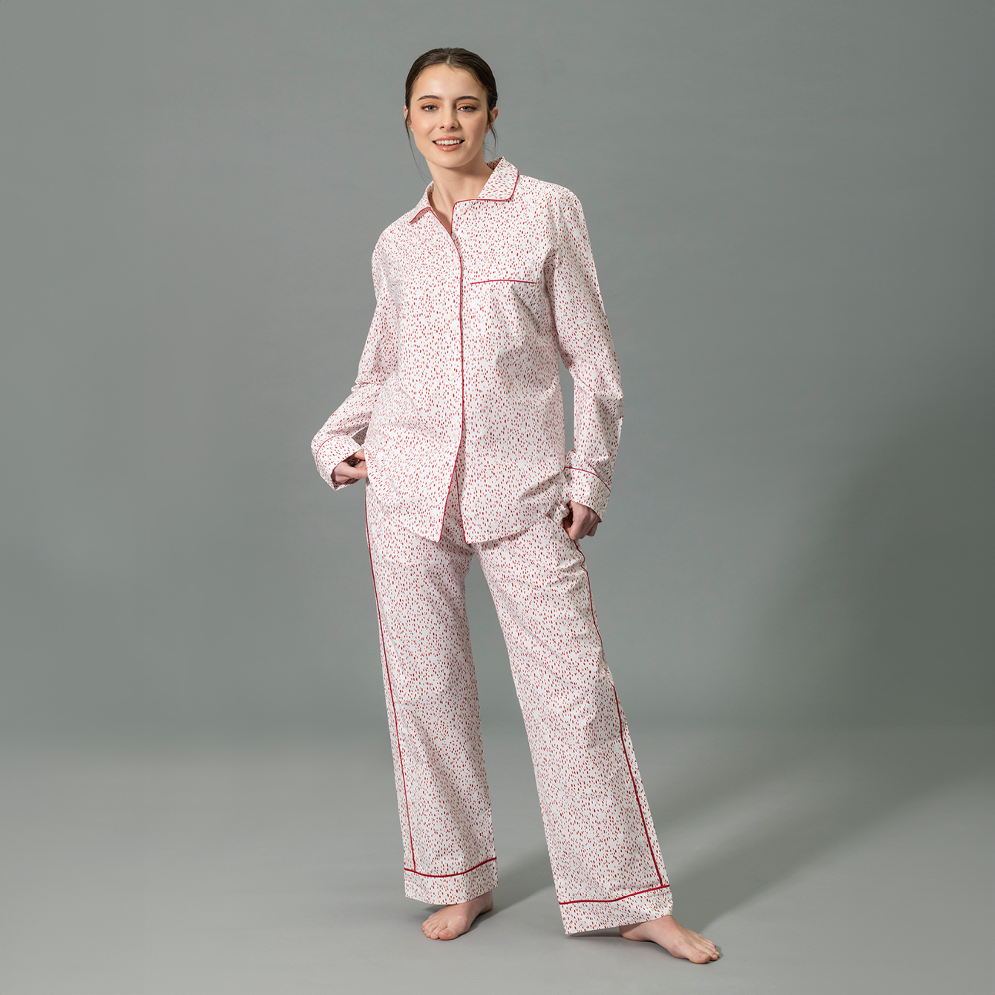 Front View of Model Wearing Matouk Luca Pajama Set in Celine Redberry