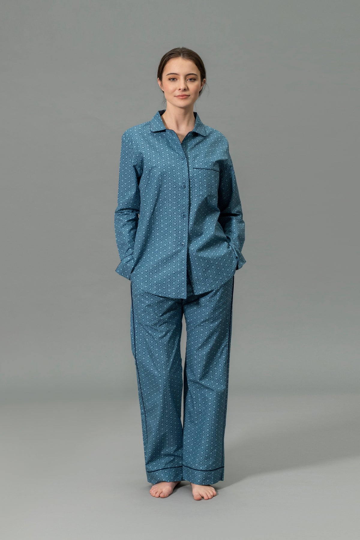 Front View of Model Wearing Matouk Luca Pajama Set in Color Levi Prussian Blue