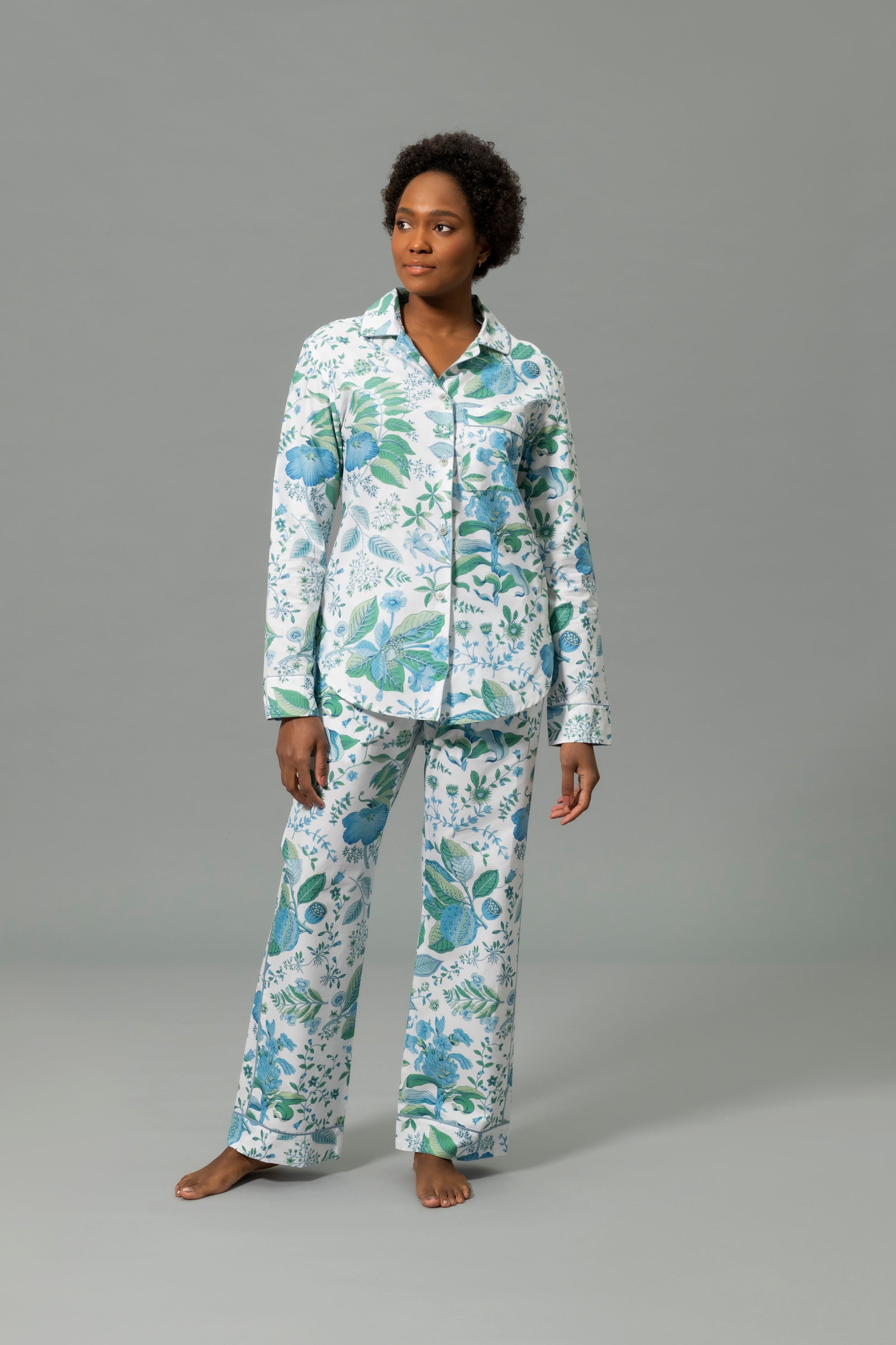 Front View of Model Wearing Matouk Luca Pajama Set in Color Levi Pomegranate Sea