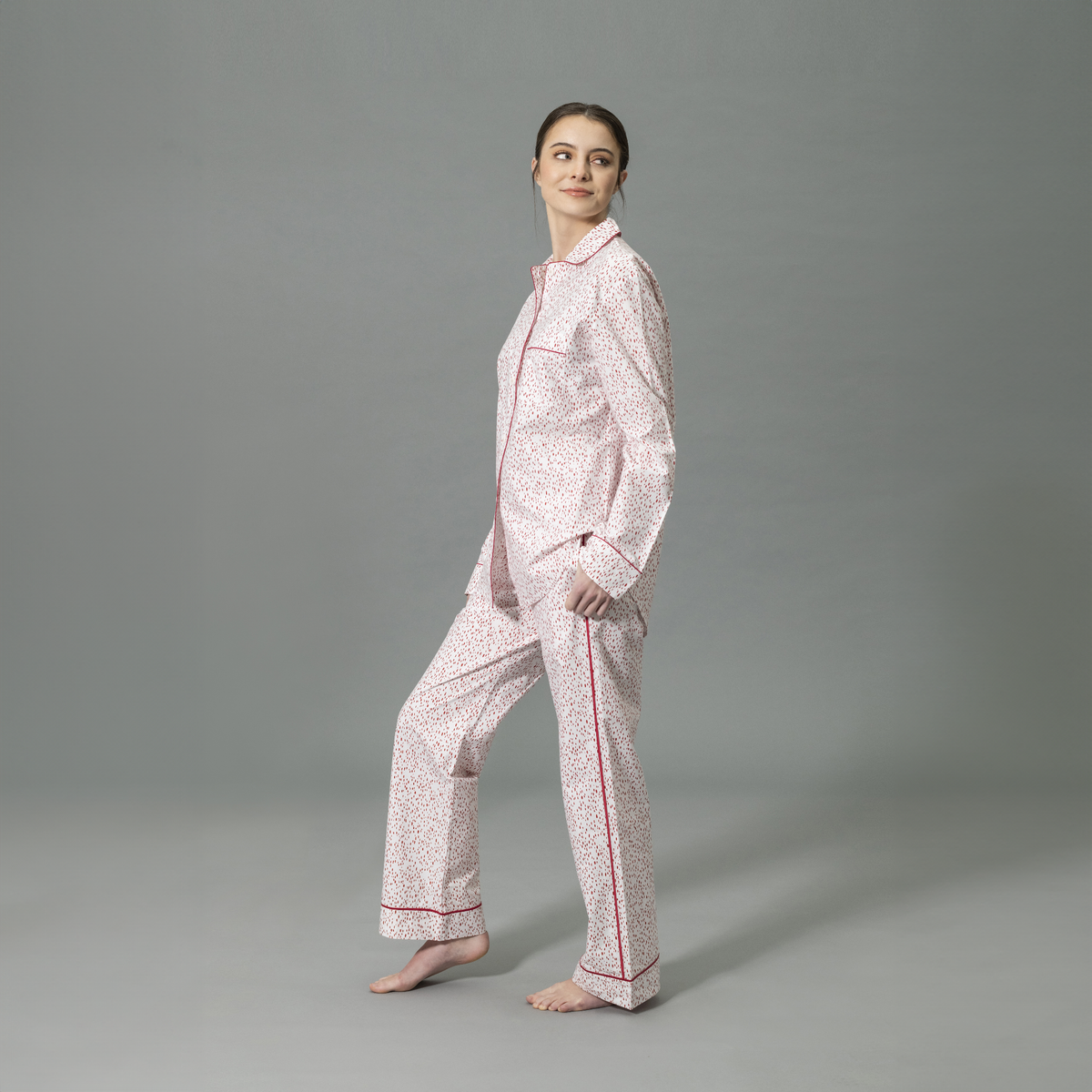 Side View of Model Wearing Matouk Luca Pajama Set in Celine Redberry