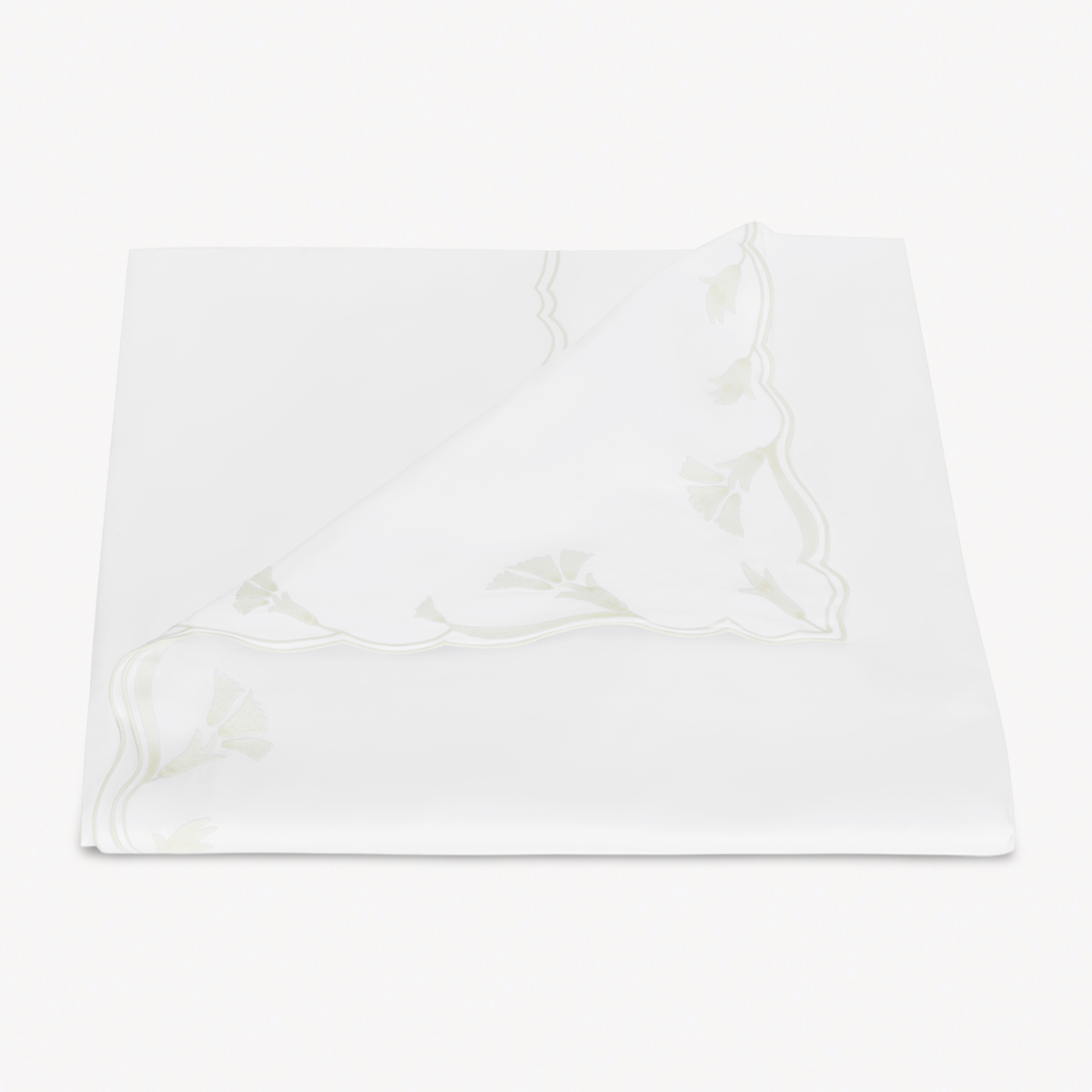 Folded Duvet Cover of Matouk Marcella Bedding in Bone