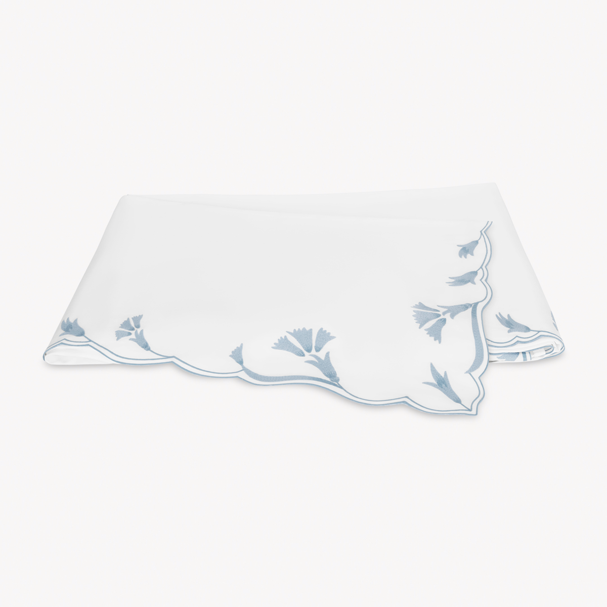 Folded Flat Sheet of Matouk Marcella Bedding in Hazy Blue
