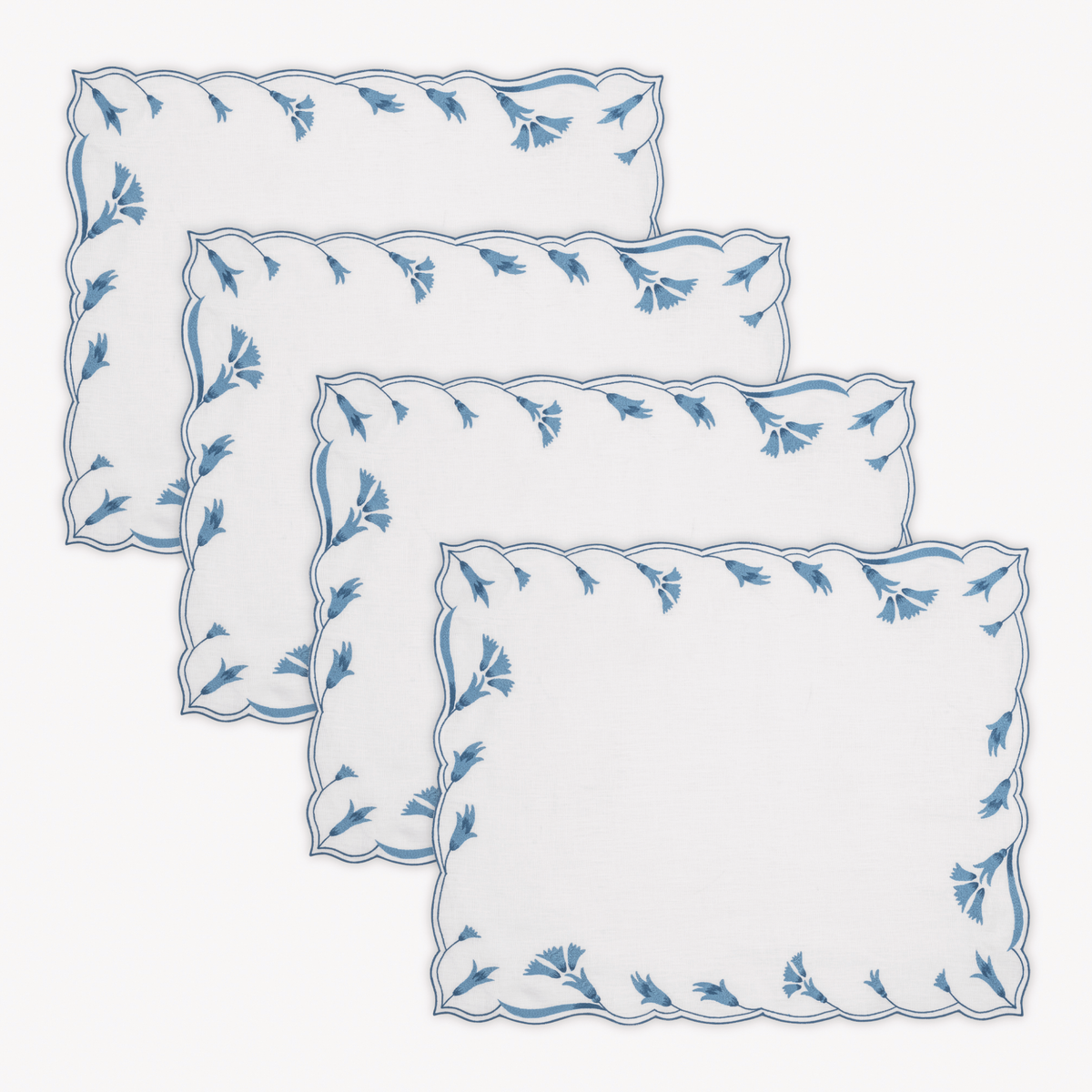 Placemats of Matouk Marcella Table Linens in Lapis color