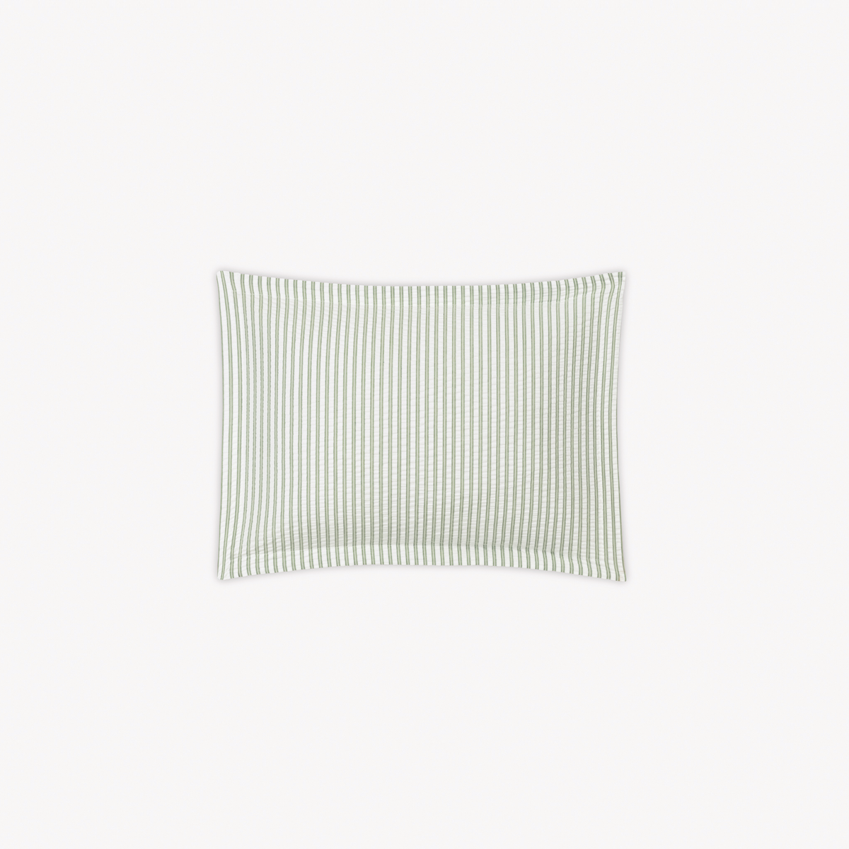 A Boudoir Sham in Palm stripes, inspired by cotton seersucker bedding from the Matouk Matteo Collection