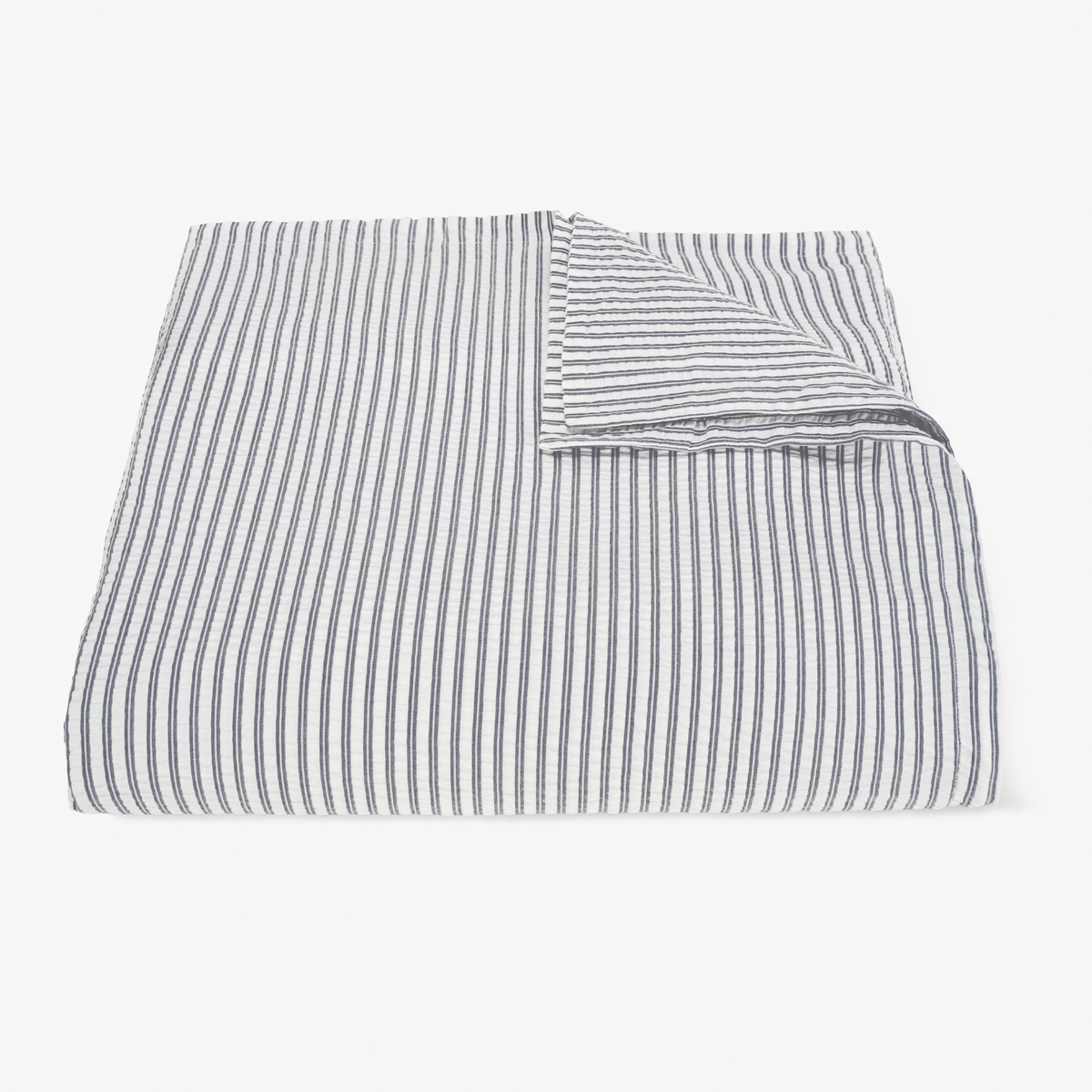 Folded Deepnavy striped cotton seersucker Duvet Cover from Matteo Bedding
