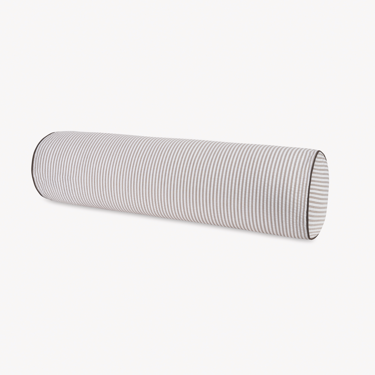 A cylindrical bolster pillow with light grey and white stripes, perfect for pairing with Matouk Matteo bedding.