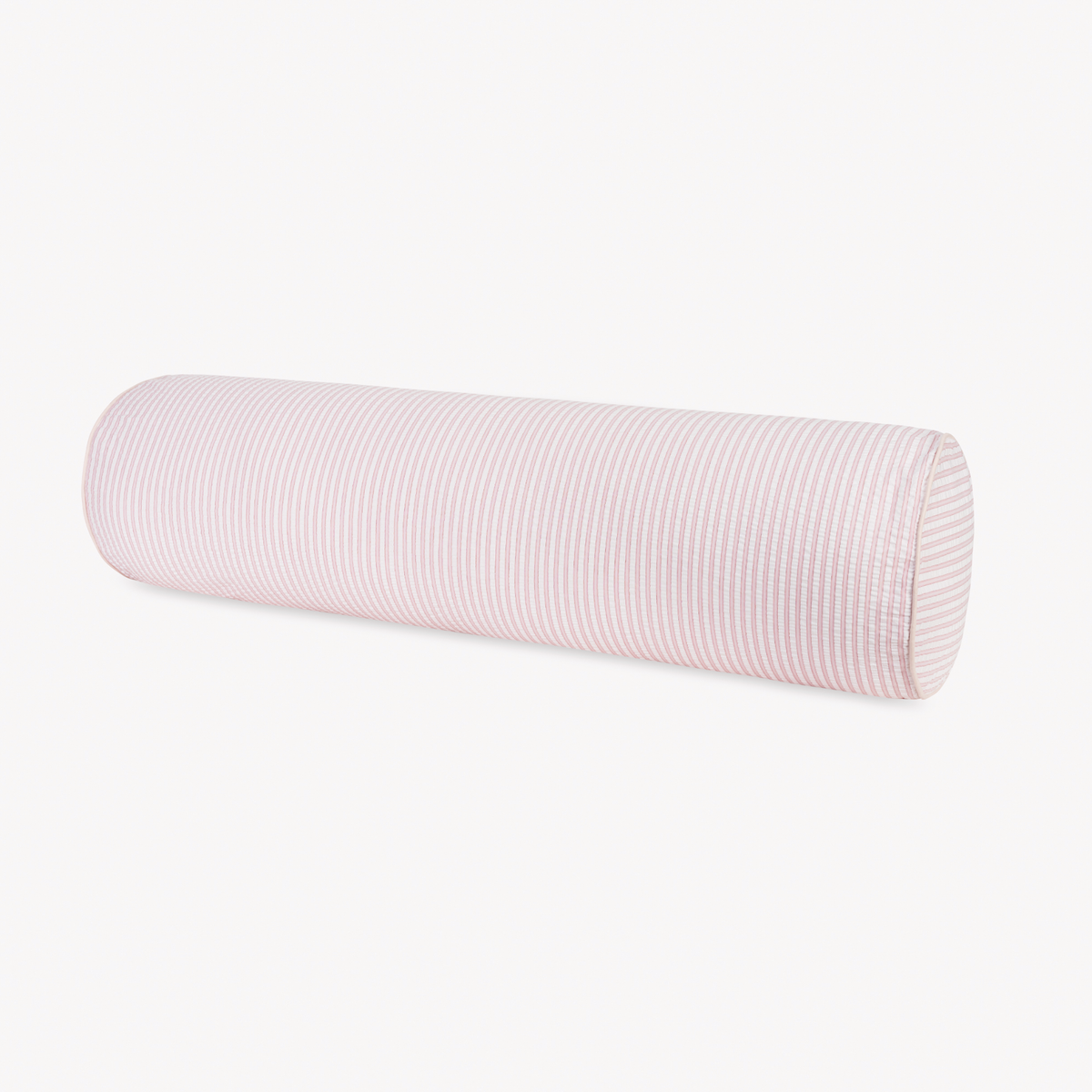 Cylindrical bolster pillow with pink and white stripes, ideal for seersucker bedding or menswear-inspired decor.