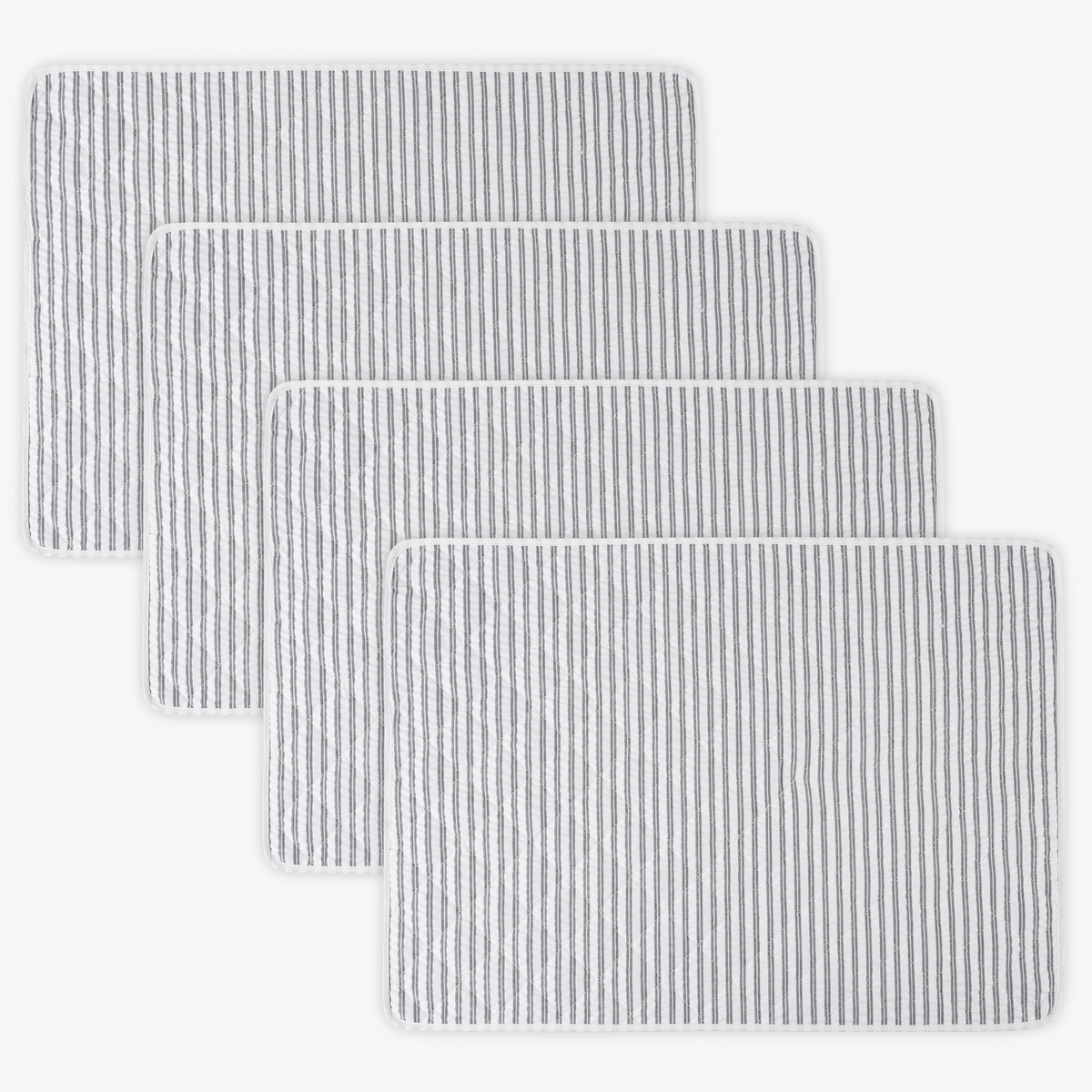 Four rectangular 100% cotton Matouk Matteo Placemats in Deep Navy color