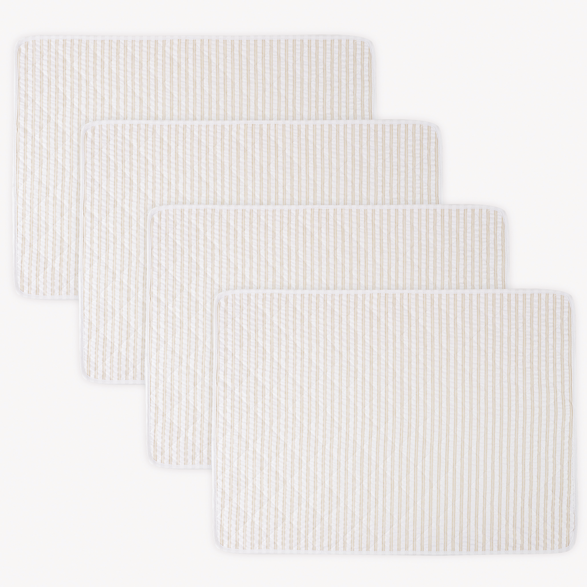 Four rectangular 100% cotton Matouk Matteo Placemats in Natural color