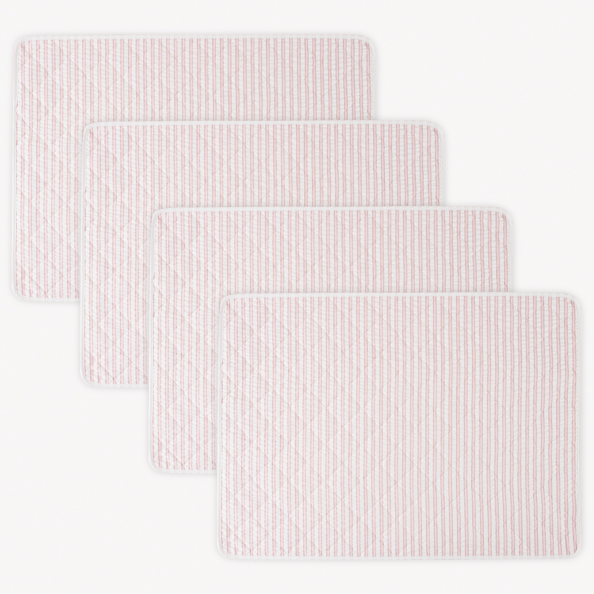 Four rectangular 100% cotton Matouk Matteo Placemats in Pink color