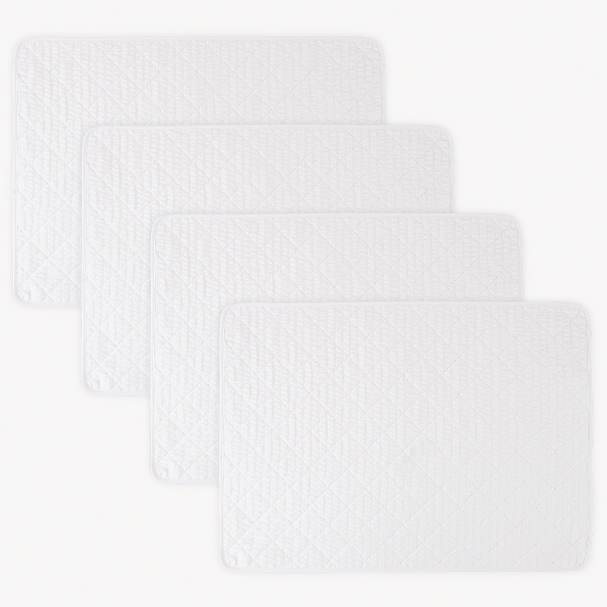 Four rectangular 100% cotton Matouk Matteo Placemats in White color