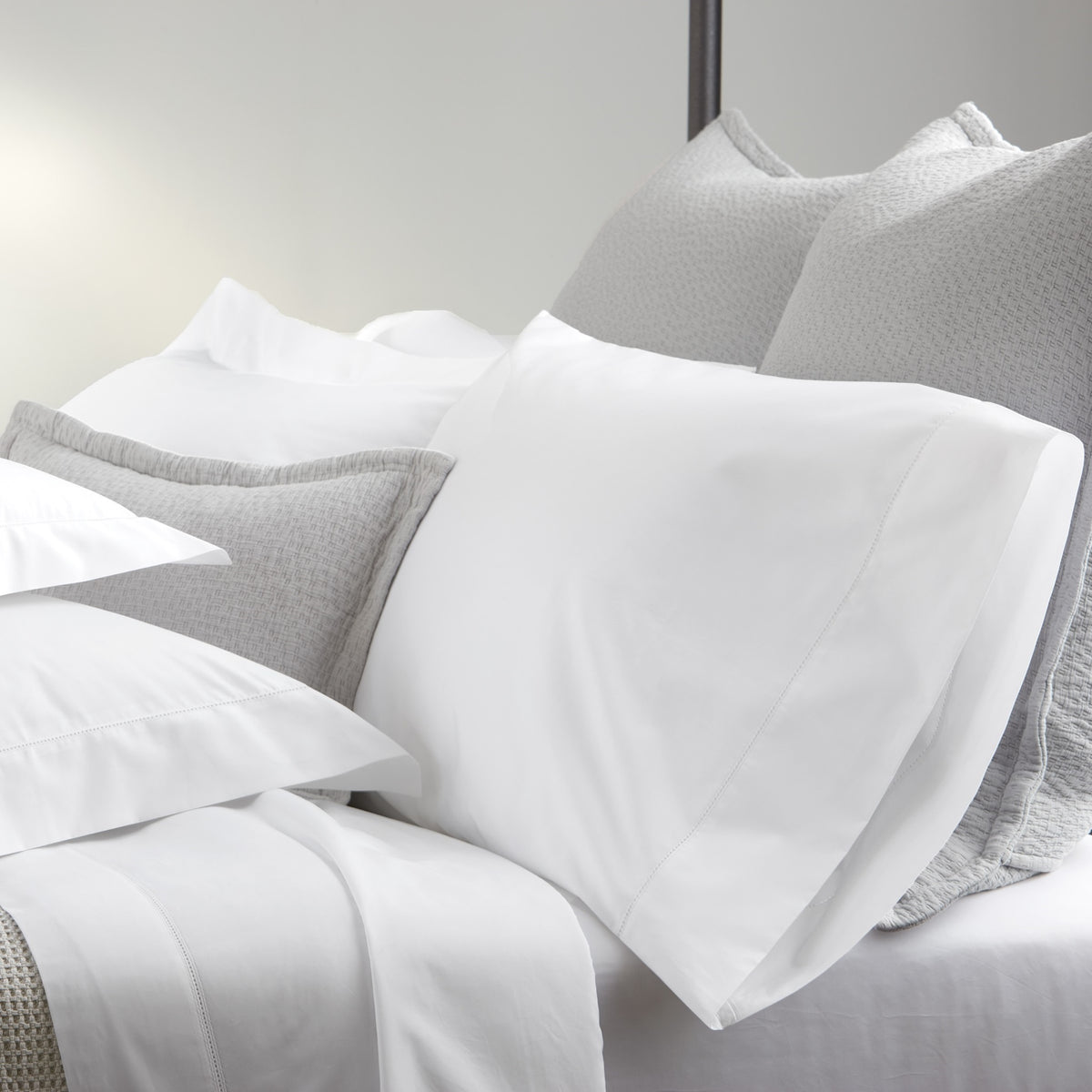 Lifestyle Image of Matouk Milano Hemstitch Bedding in Color White