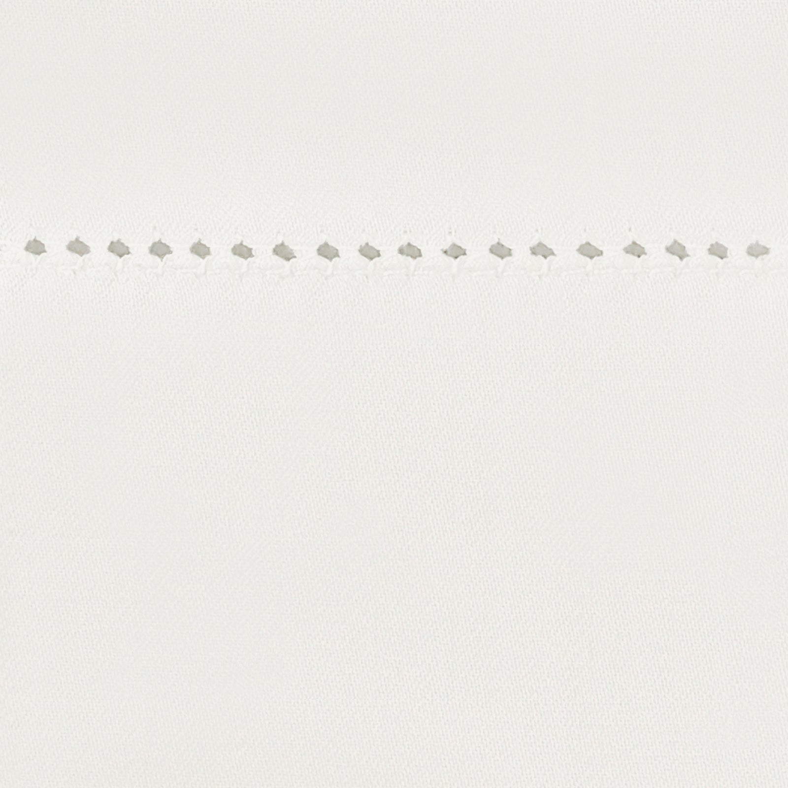 Bed Dressed in Matouk Milano Hemstitch Bedding with Swatch in Color Bone