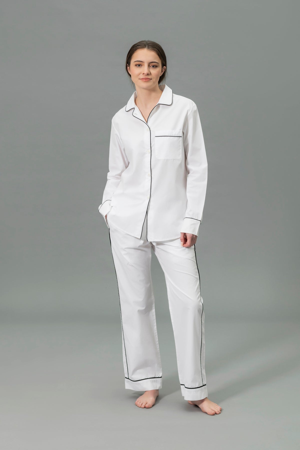 Front View of Model Wearing Matouk Milano Pajama Set in Color Black