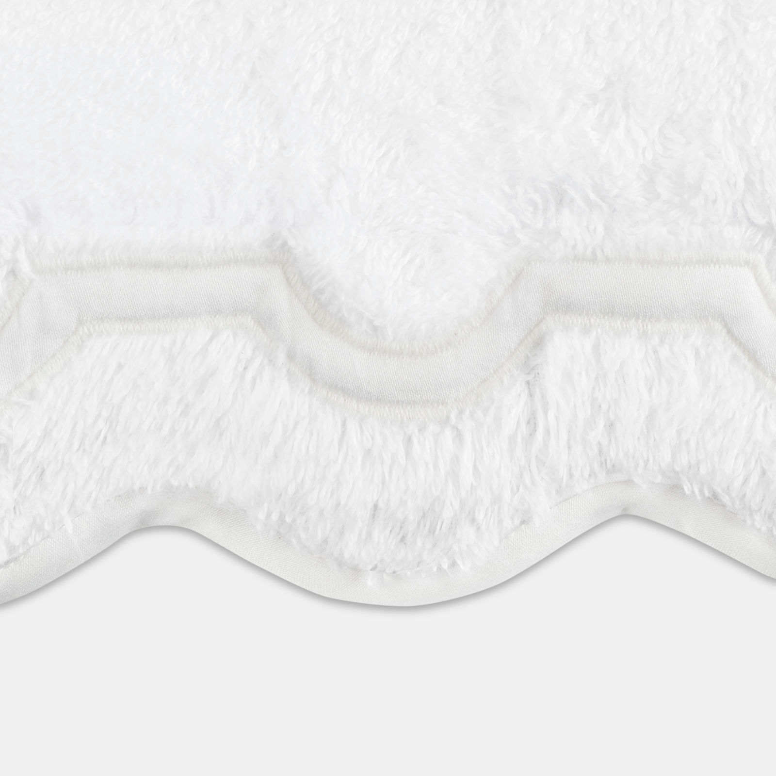 Folded Matouk Mirasol Bath Towels in Bone Color