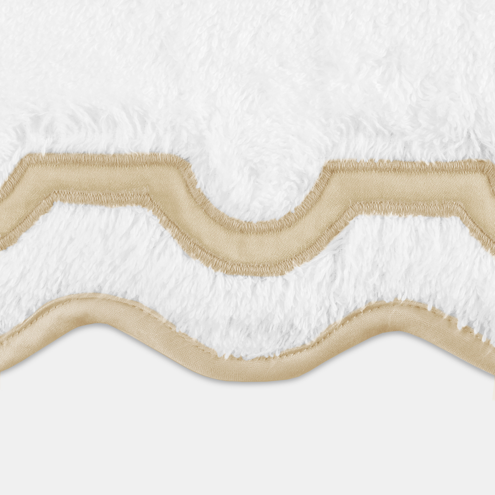 Folded Matouk Mirasol Bath Towels in Champagne Color