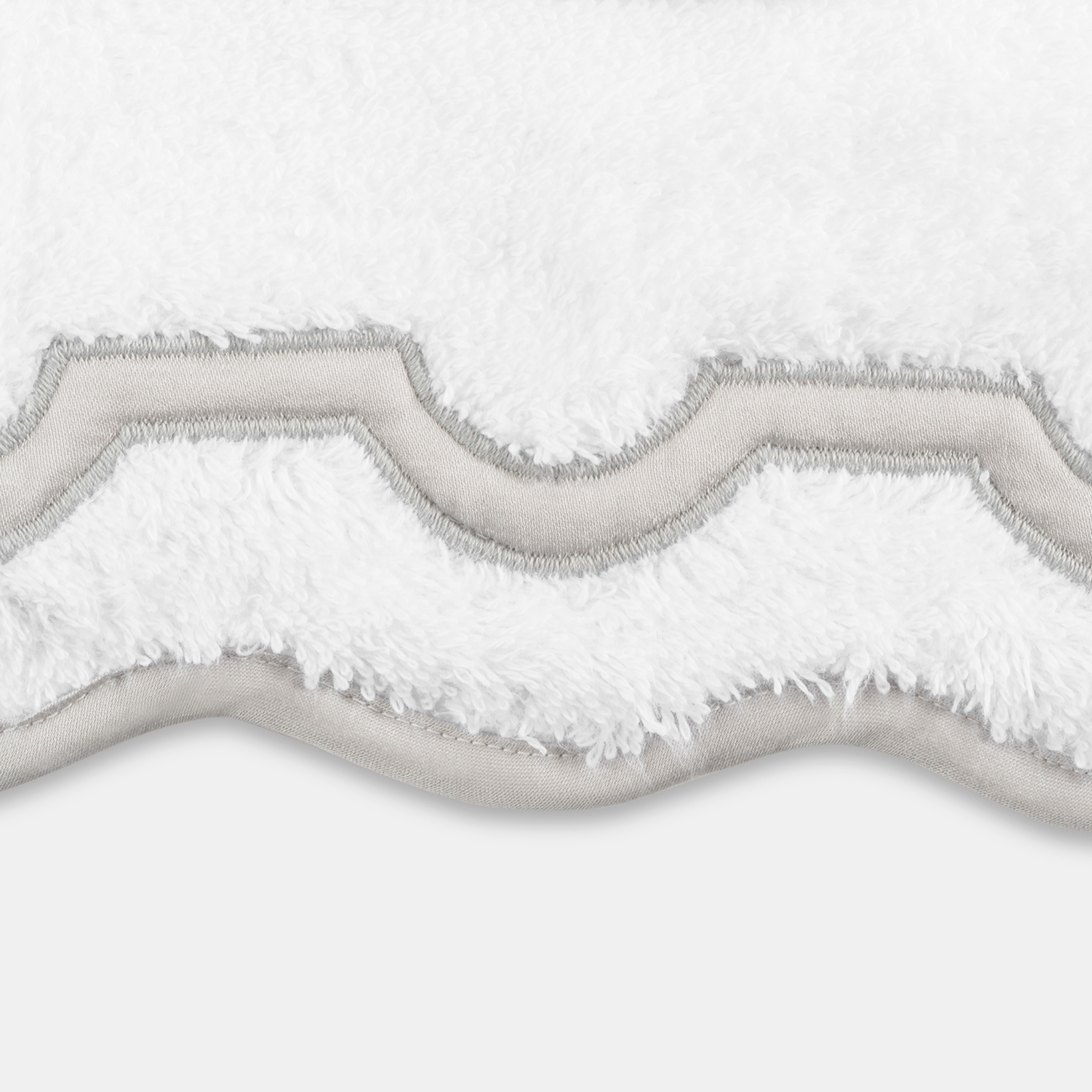 Folded Matouk Mirasol Bath Towels in Silver  Color