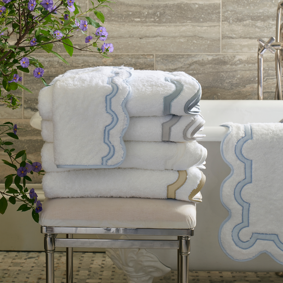 Stack of Matouk Mirasol Bath Collection in All Colors