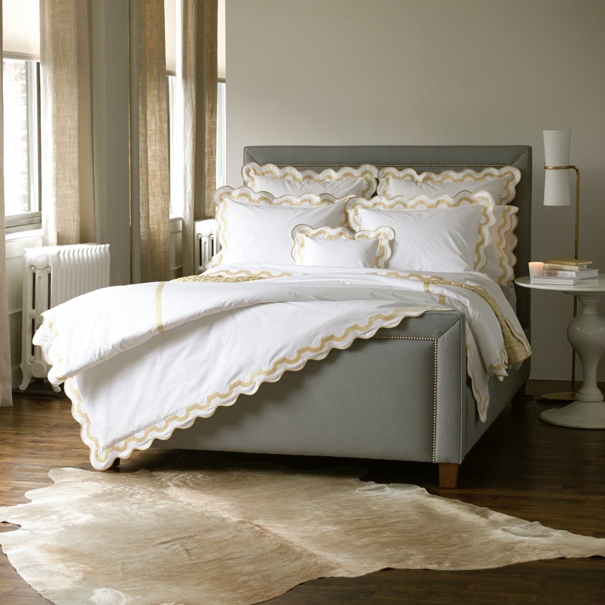 Full Bed Dressed in Matouk Mirasol Collection in Champagne Color