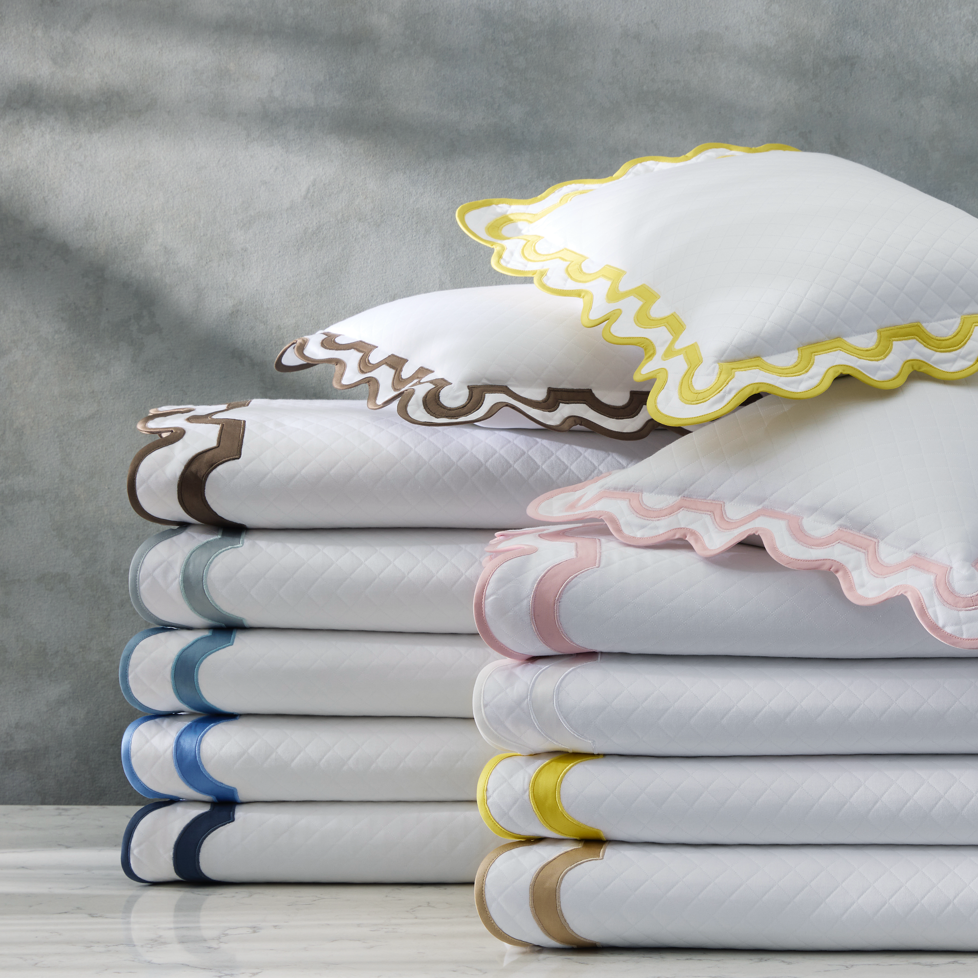 Matouk Mirasol Matelassé Bedding Stacked Shams and Folded Coverlets