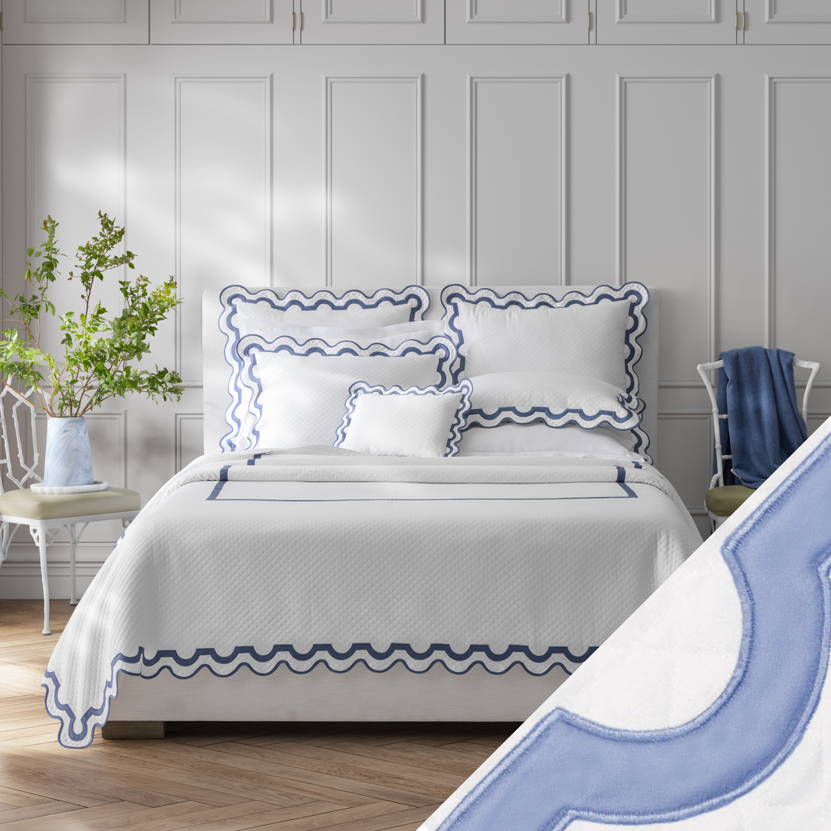 Full Bed Dressed in Matouk Mirasol Matelassé Bedding with Swatch in Azure