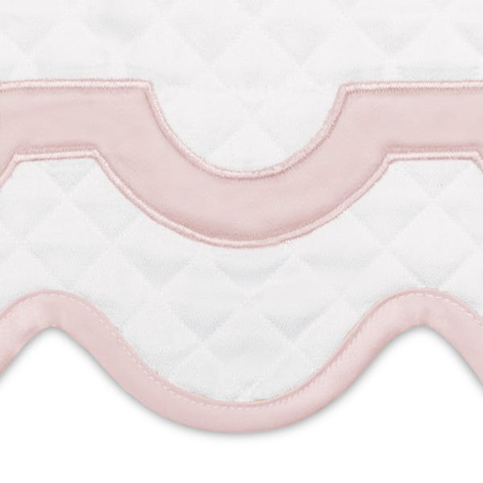 Full Bed Dressed in Matouk Mirasol Matelassé Bedding with Swatch in Pink