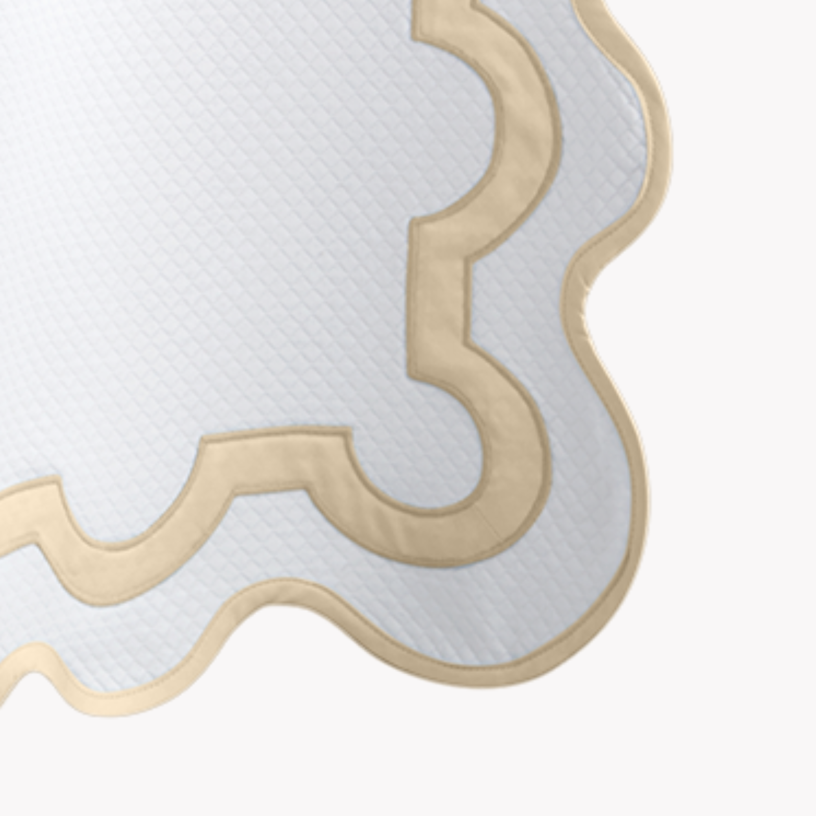 Hanging Edges of Matouk Mirasol Pique Shower Curtain in Champagne Color